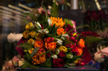 Beautiful Bouquet. Spring flowers in the cold dark room of the flower shop