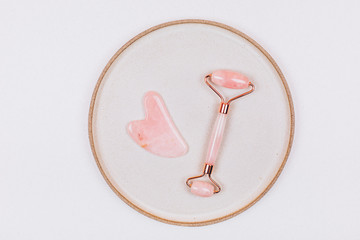 Facial massage kit. Face roller and gua sha massager made from natural stones.