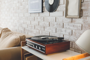 Record player on table in room