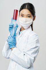 young doctor with syringe