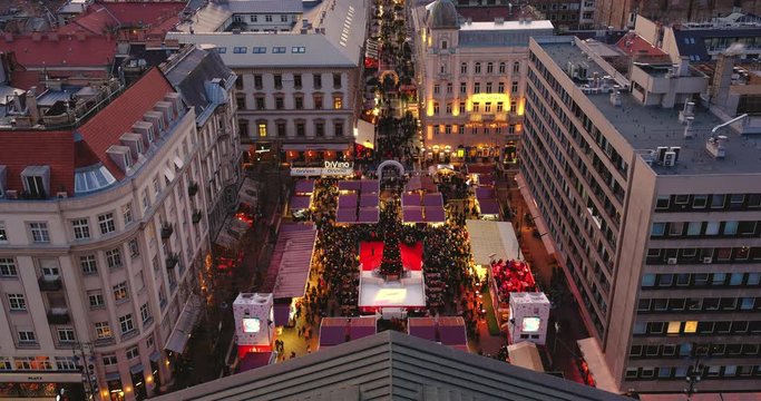 BUDAPEST, HUNGARY - DECEMBER 04, 2019: people visiting the christmas markets at the St. Stephen's Square in Budapest.
