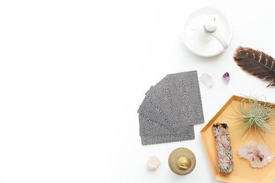 Tarot Cards On A White Background. Reading, Feathers, Crystals.