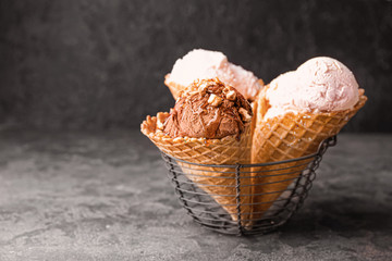 Sweet tasty ice-cream on table