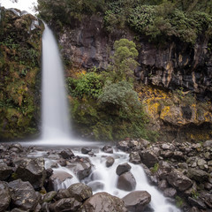 Fototapeta na wymiar Silky smooth water flow of a waterfall