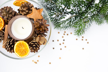 Christmas tree snow with candle and orange and cones and stars and little golden stars 