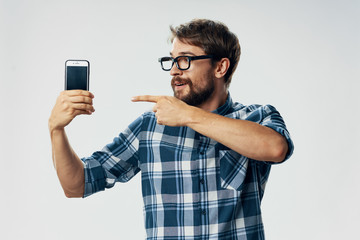 man taking photo with mobile phone isolated on white