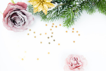 Christmas wreath with pink rose and golden flower and little stars 