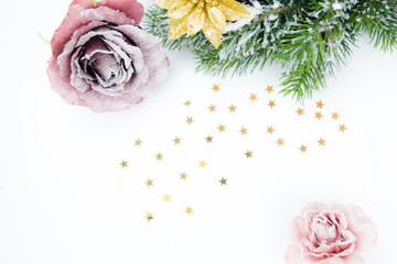 Christmas wreath with pink rose and golden flower and little stars 