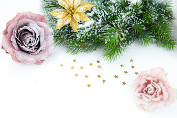Christmas wreath with pink rose and golden flower and little stars 