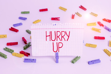 Writing note showing Hurry Up. Business concept for asking someone to do a job very fast Quickly Lets go Encourage Colored clothespin papers empty reminder white floor background office