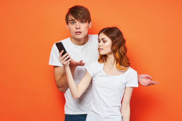 young couple in t-shirts chatting