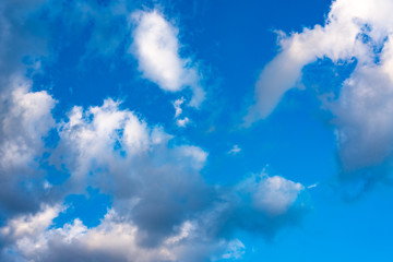 Obraz premium Blue sky with white clouds. Blue sky with black clouds.