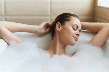 woman relaxing in bath