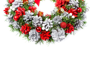 Christmas card with free copy space for text, decorative Christmas wreath of cones and Christmas decorations.