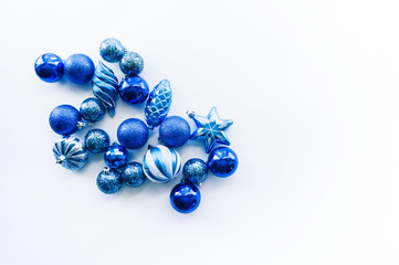 Trendy blue Christmas background. Ball toy Minimal monochrome concept.