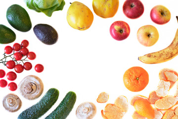 Flat lay of fruits and vegetables isolated on white background, with copy space in the center. Concept for healthy plant based diet.