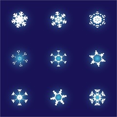 Kit of simple, beautiful snowflakes on blue background.