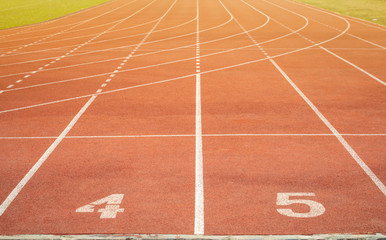 The number at start point of running track or athlete track in stadium. Running track is a rubberized artificial running surface for track and field athletics.