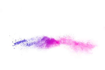 Freeze motion of purple color powder exploding on white background.