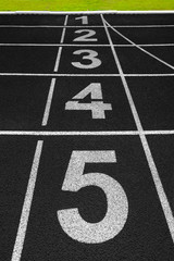 Aerial of running track lanes shot from above