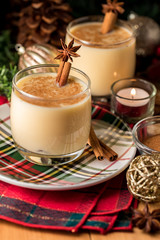 Close up of eggnog and cinnamon.