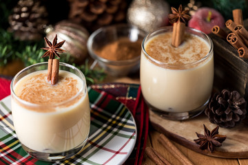Two glasses of egg nog for drinking.