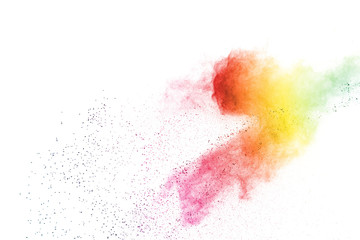Freeze motion of colorful color powder exploding on white background.  Paint Holi.