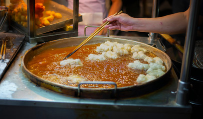 Picture of food being fried in oil