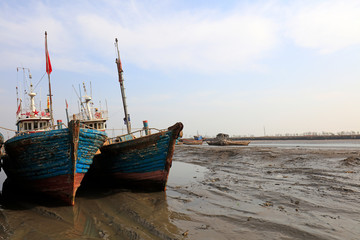 Obraz premium wooden fishing vessel in fishing port wharf, China