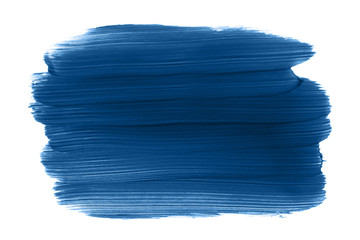 Classic blue color swatch. Paint brush strokes isolated on white background. Year 2020 trend