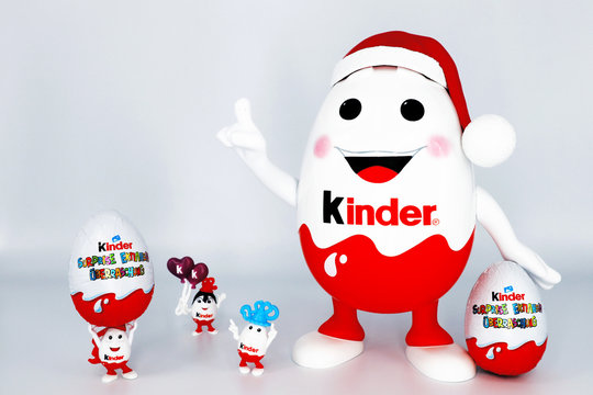 Italy &ndash; November 28, 2019: Kinder Surprise Chocolate Eggs with Kinderino Eggman Mascot. Kinder Surprise is a brand of products made in Italy by Ferrero