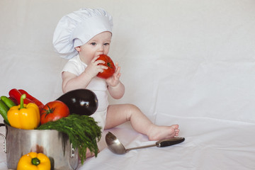 little boy eating vegetables