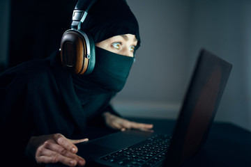 hacker stealing data from laptop