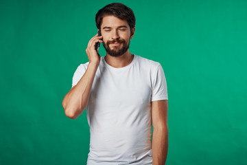 young man listening to music with headphones