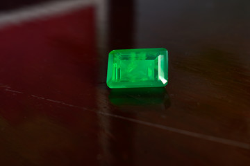 Emerald green On the glass floor and reflections