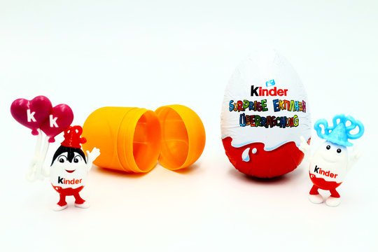 Italy &ndash; November 28, 2019: Kinder Surprise Chocolate Eggs with Kinderino Eggman Mascot. Kinder Surprise is a brand of products made in Italy by Ferrero