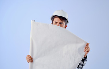 architect with blueprint