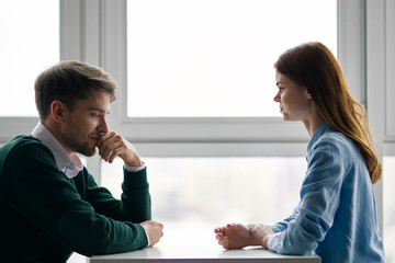 man and woman shaking hands