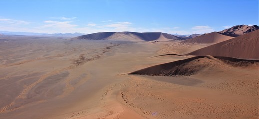 Fototapeta na wymiar Beautiful scenic panorama view from big daddy also known as Dune 45 in Namib Naukluft Nationalpark, Sossusvlei, Namibia