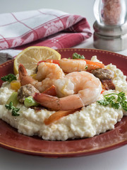 Shrimp with Vegetables on Bed of Grits Vert (red)