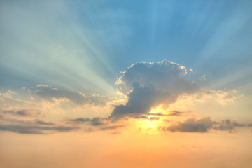 dramatic sky with clouds and sun
