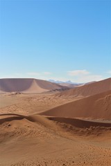 Fototapeta na wymiar Beautiful scenic panorama view from big daddy also known as Dune 45 in Namib Naukluft Nationalpark, Sossusvlei, Namibia