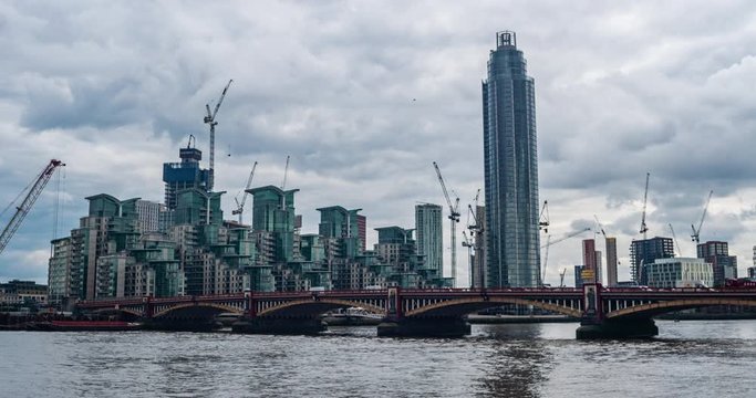 A timelapse of the River Thames and the Business Center in London, England.