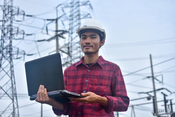 Electrical Engineering holding computer notebook inspection work power plant system background Technology