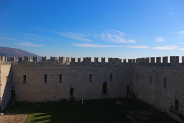 the courtyard and walls of medieval emperor's castle in Prato, italy