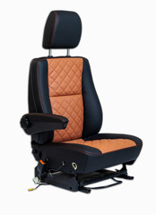 One sport seat of van with armrest with black and brown leather trim, located on the white isolated...