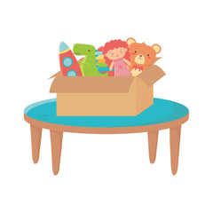 kids zone, table with box filled bear doll rocket dinosaur toys