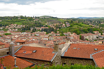 The hill view on orange roofs of le Puy-en-Velay city in France