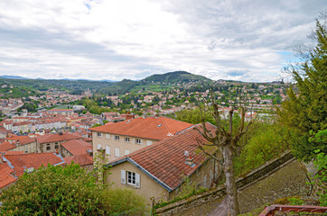 The hill view on orange roofs of le Puy-en-Velay city in France