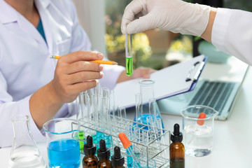 Research and development concept, Laboratory scientist working at lab with test tubes about medicine